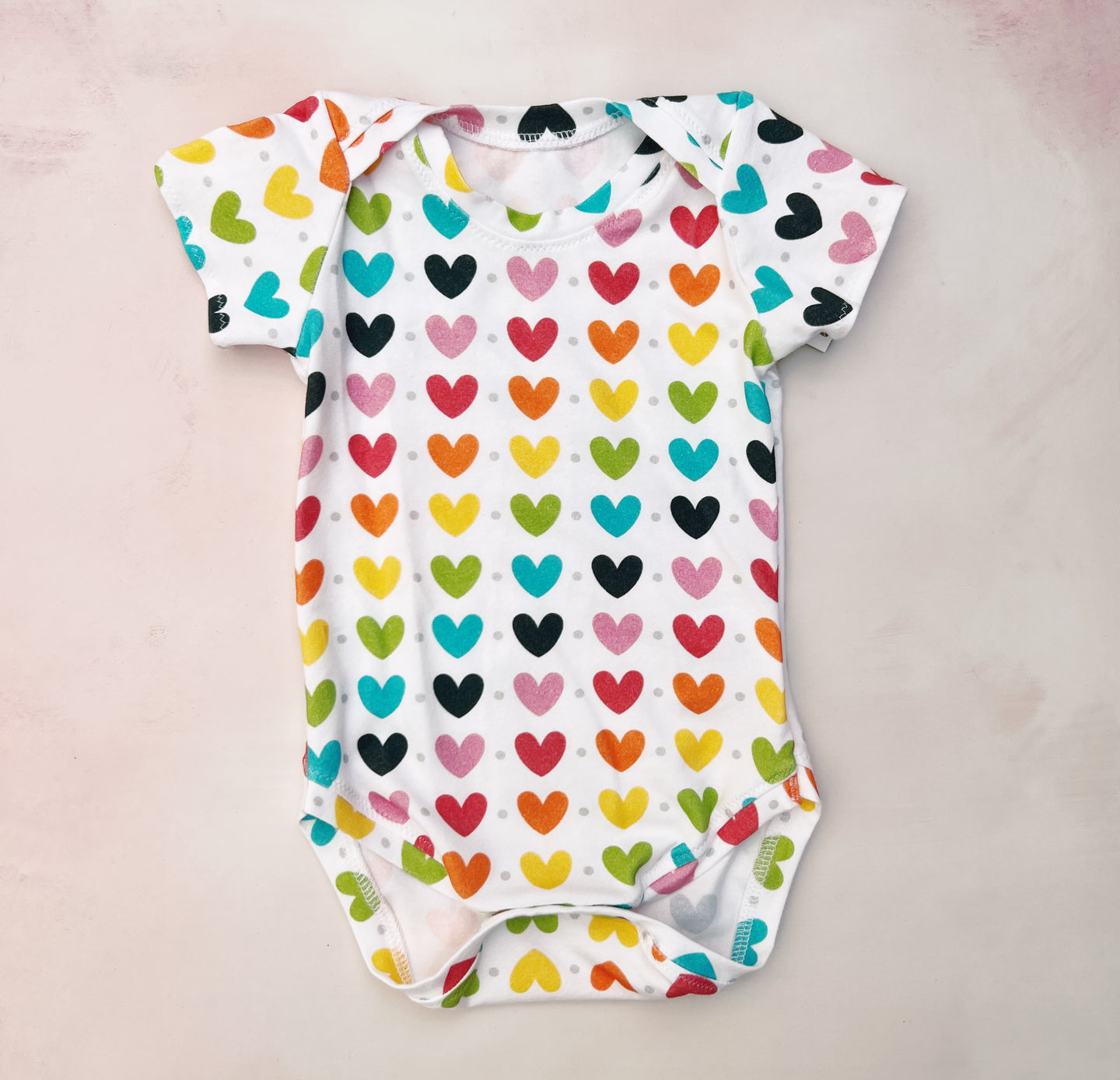 onesie- rainbow hearts