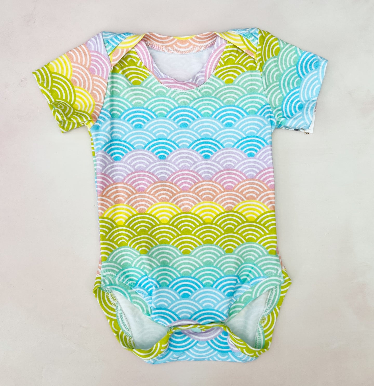 onesie- pastel scallop