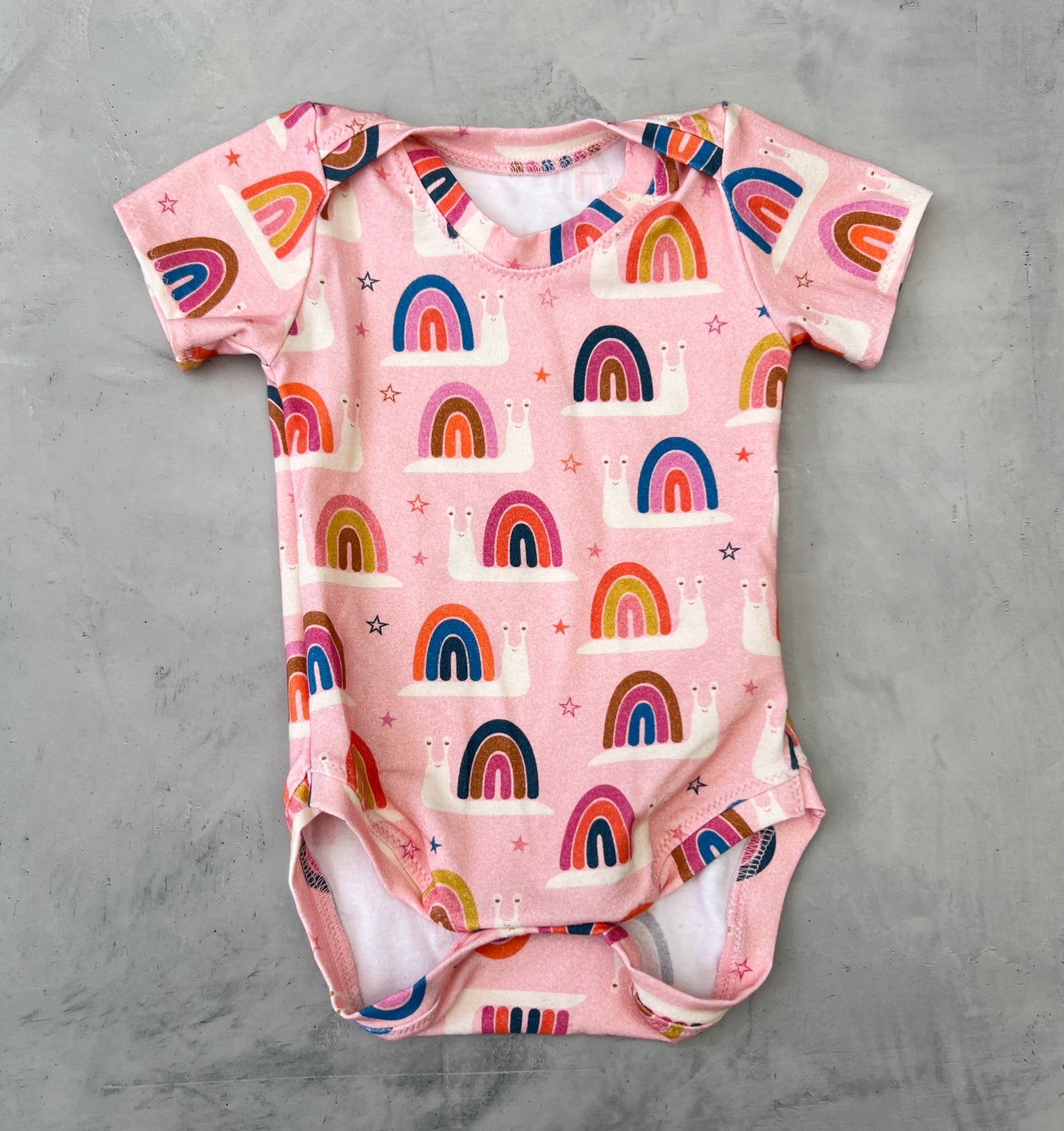 pink snails onesie