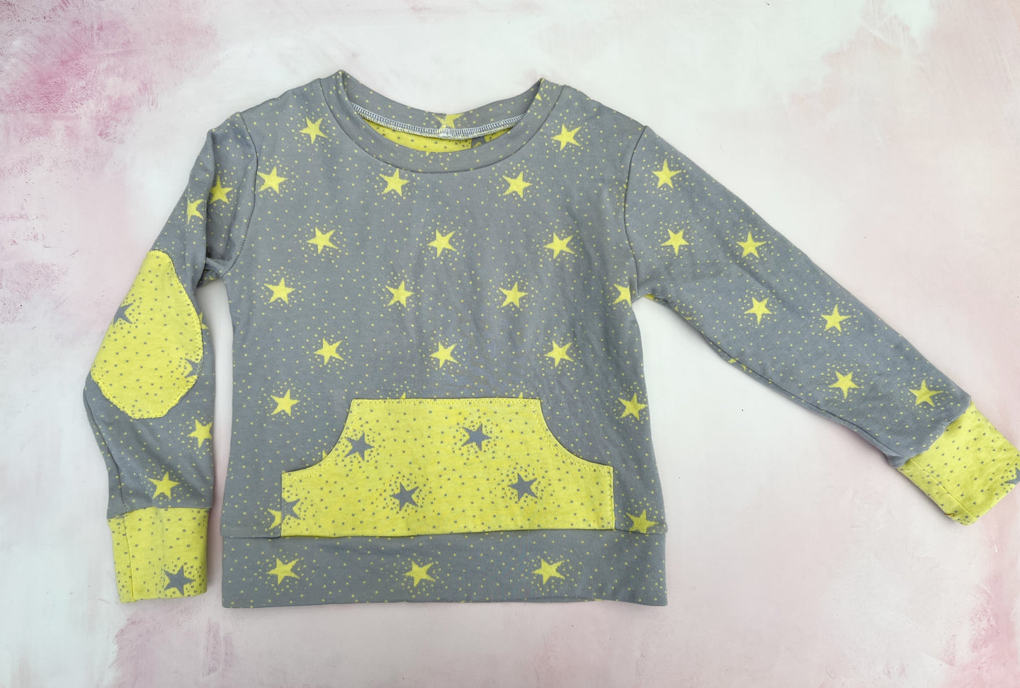 gray and yellow stars sweater