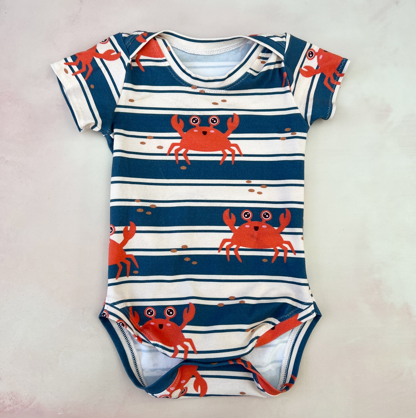 crabby onesie