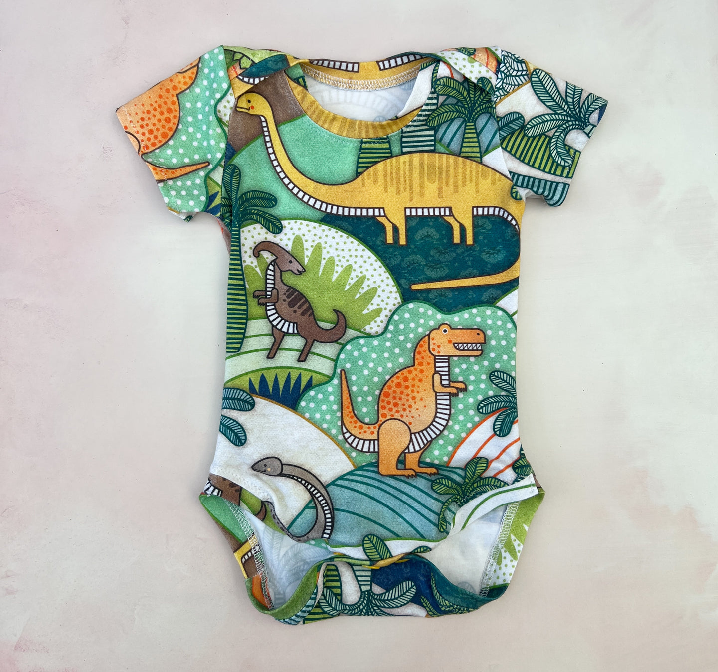 happy dinos onesie