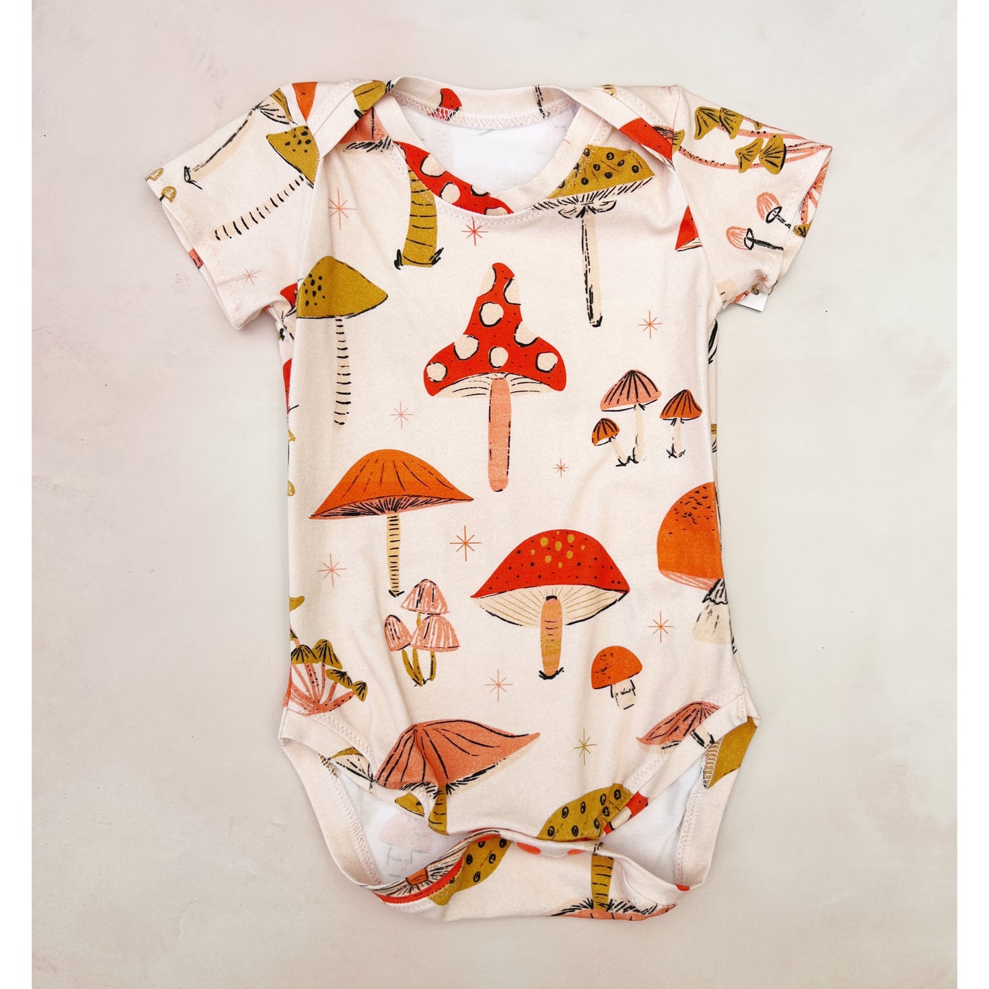 onesie- blush mushrooms
