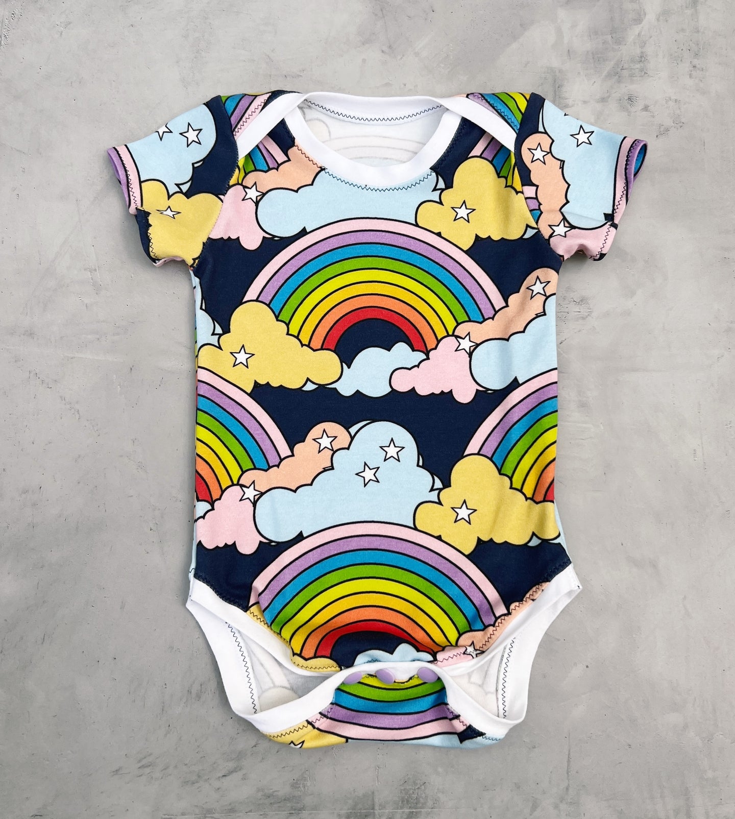 onesie- navy with rainbows
