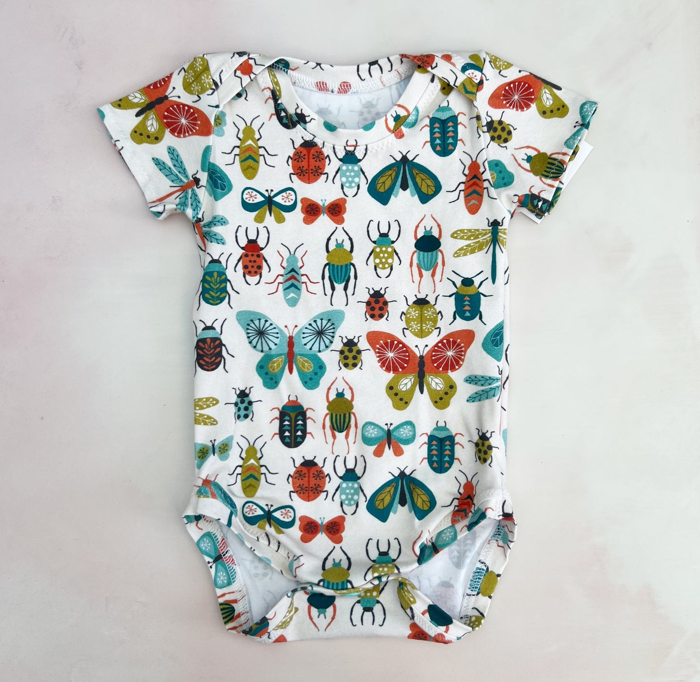 beetles and moths onesie