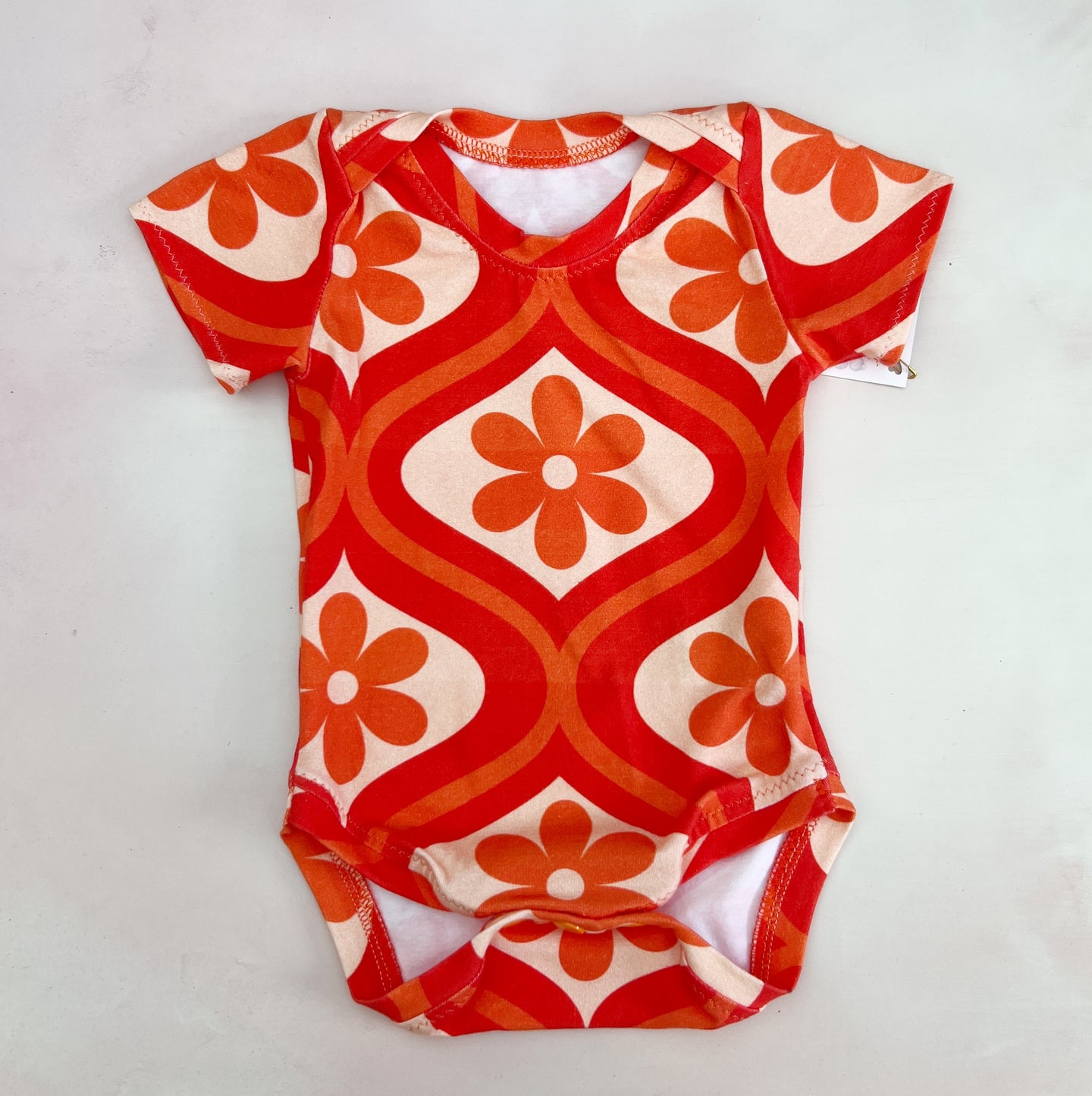 orange daisy onesie