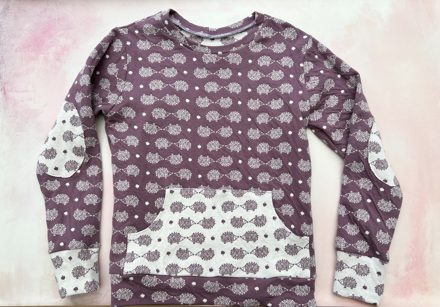 purple hedgehog sweater