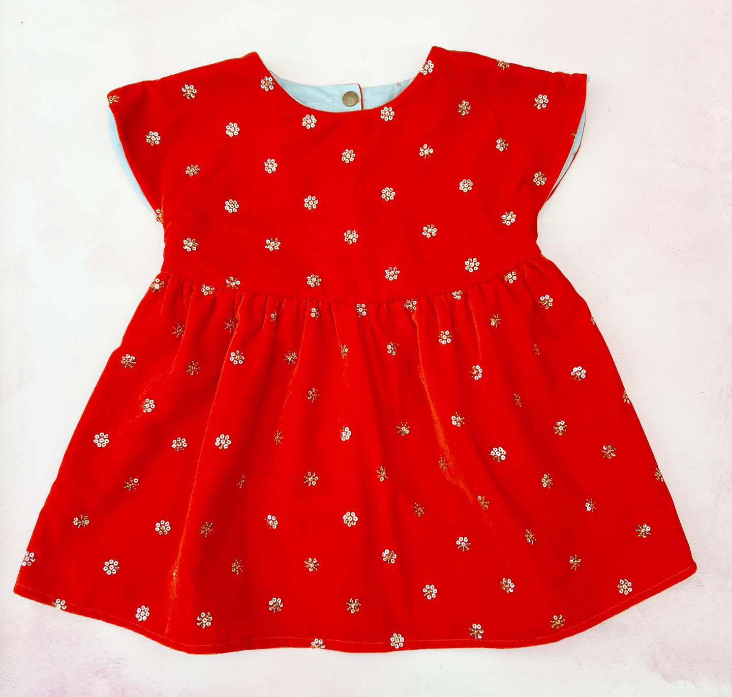 Malina- red velvet-ish with gold flowers