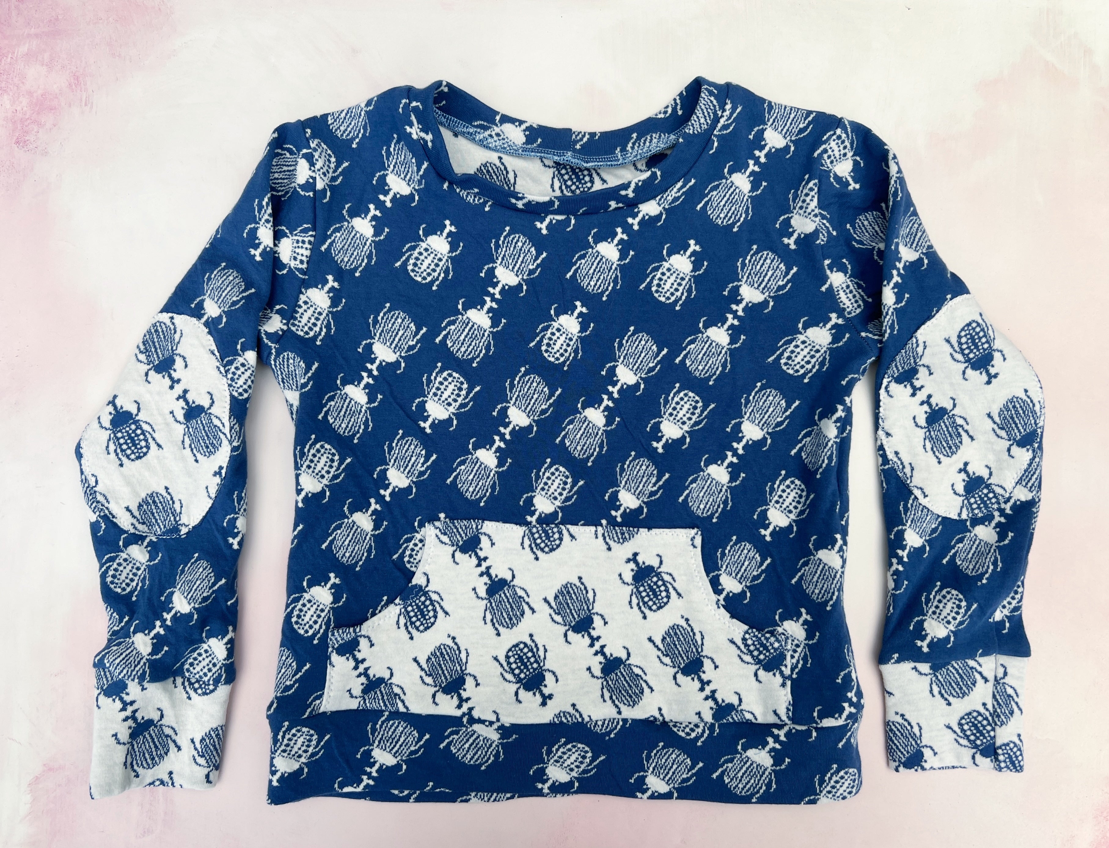 blue beetles sweater