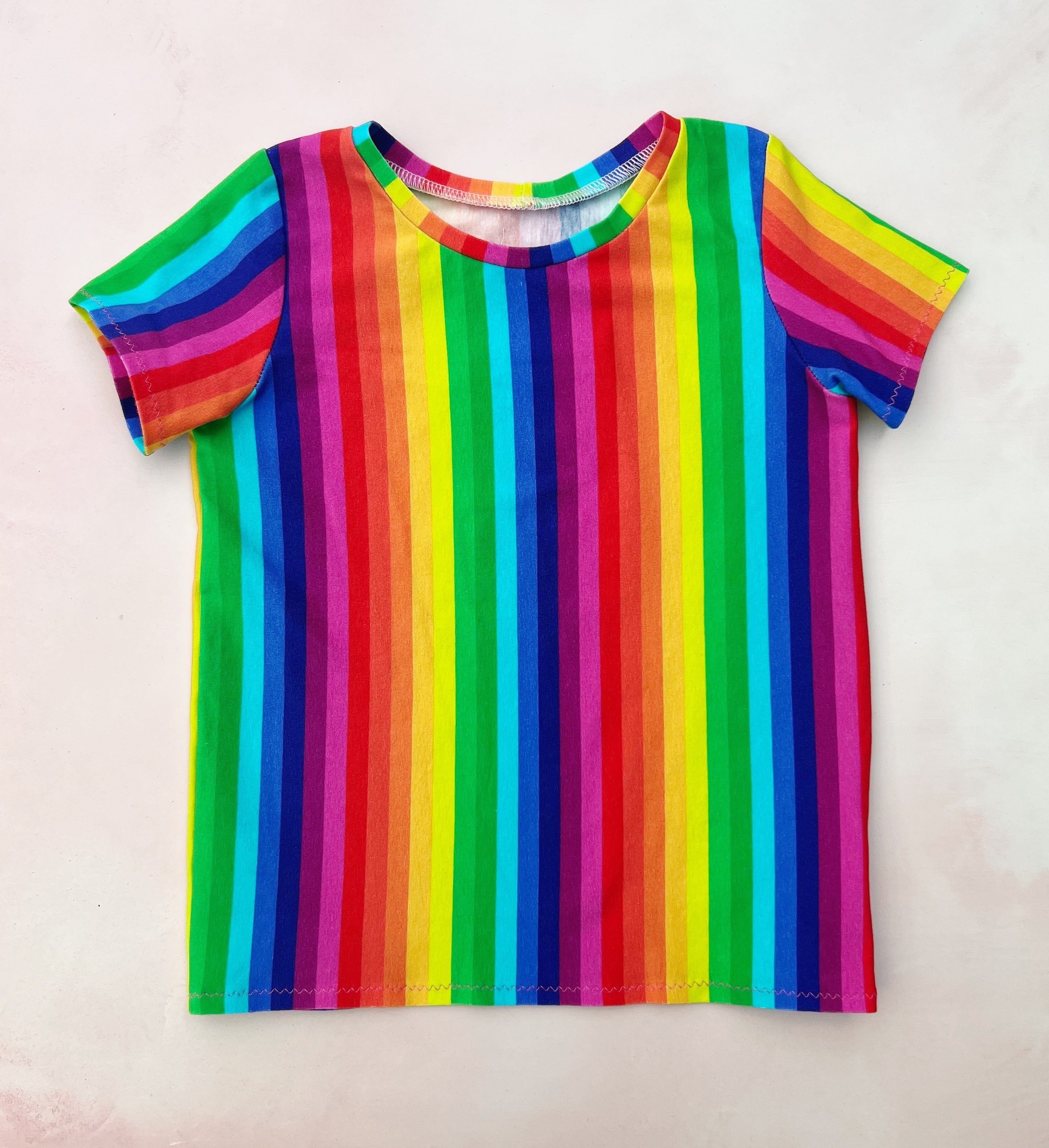 vibrant rainbow stripe tee