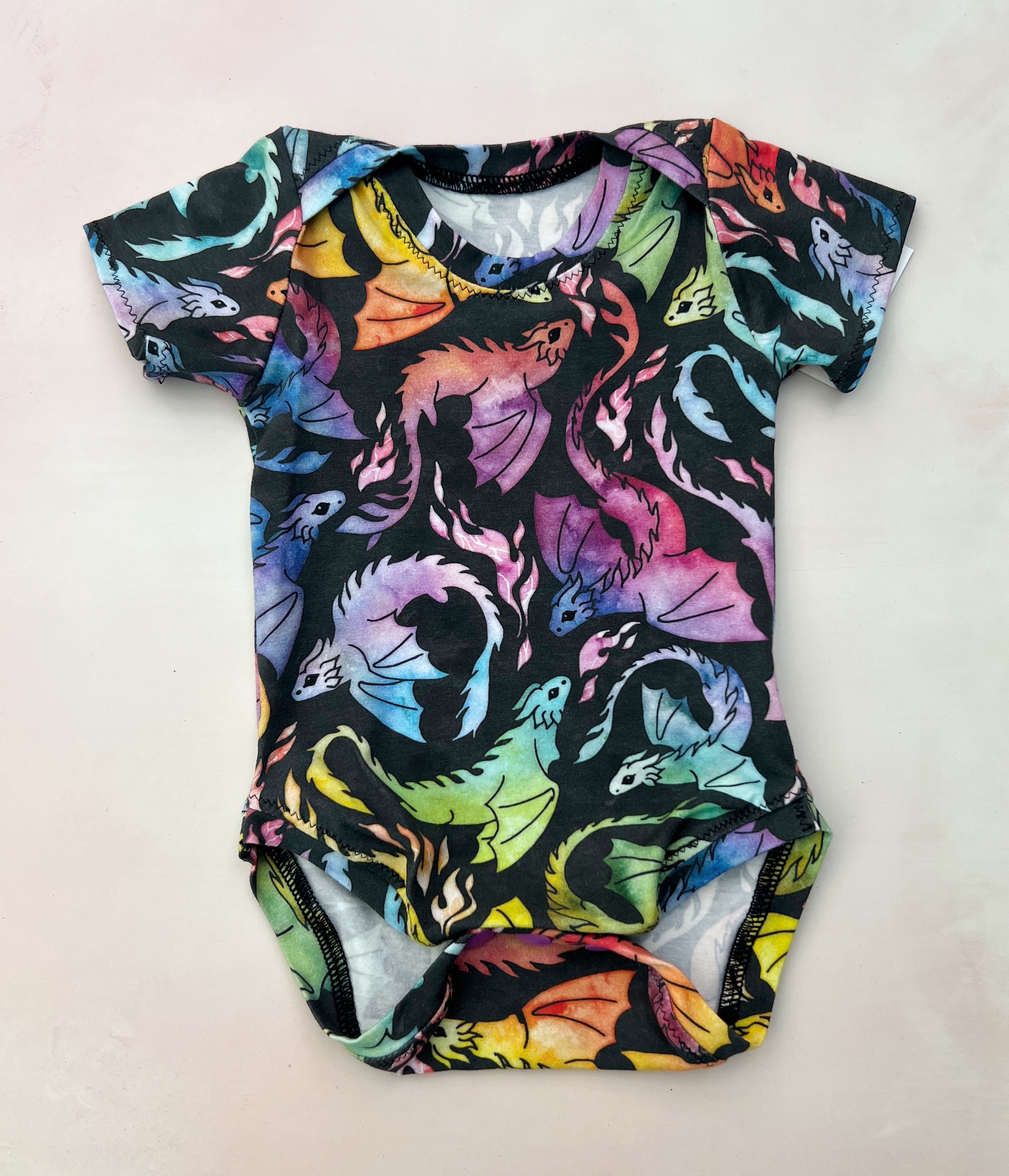 rainbow dragons onesie